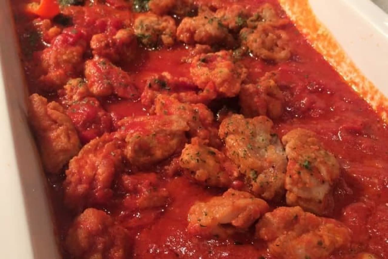 Plump juicy, chicken simmered in tomato