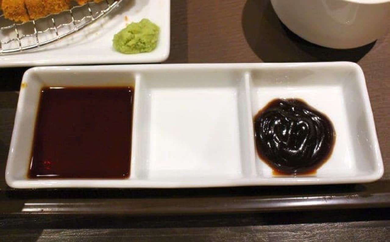 Sweet soy sauce on the left and miso sauce on the right