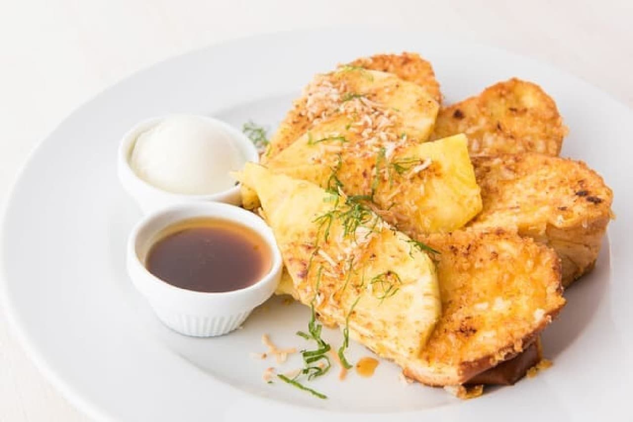 Pineapple Macadamia French Toast is a French toast topped with caramelized pineapple