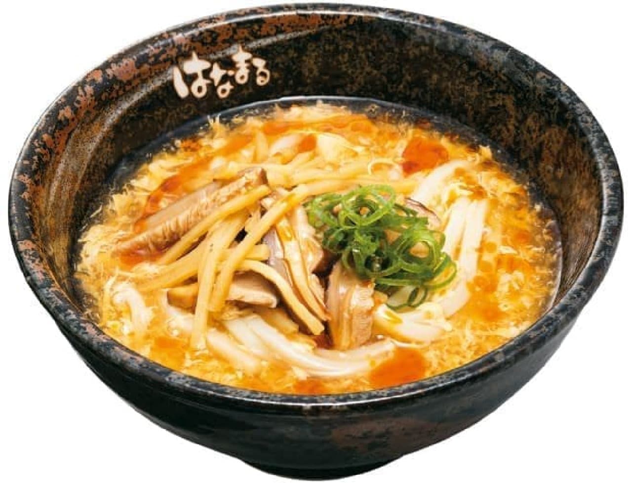Hot and sour soup udon is based on egg ankake and topped with shiitake mushrooms, shredded bamboo shoots, and green onions.