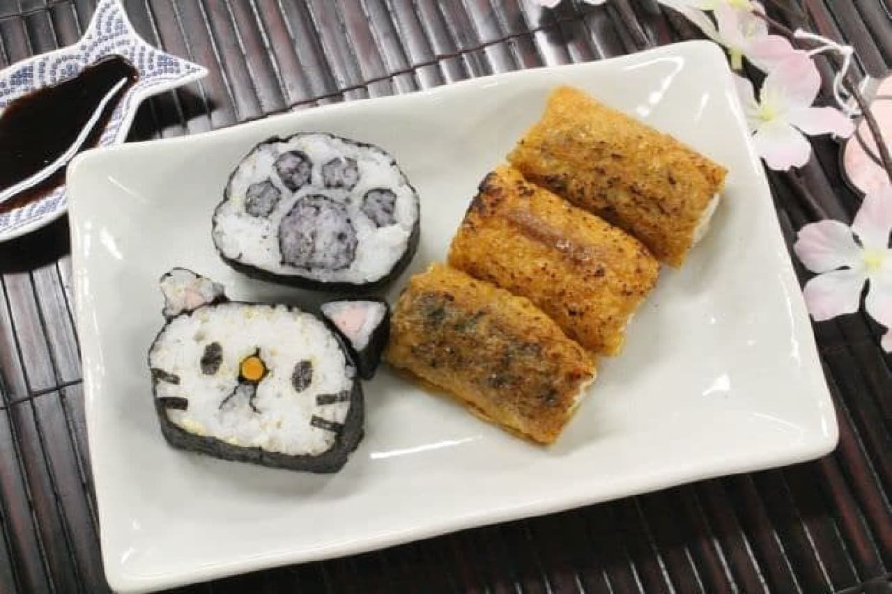 「若廣の肉球助六セット」は、猫の顔や肉球を模した太巻きが入った助六寿司