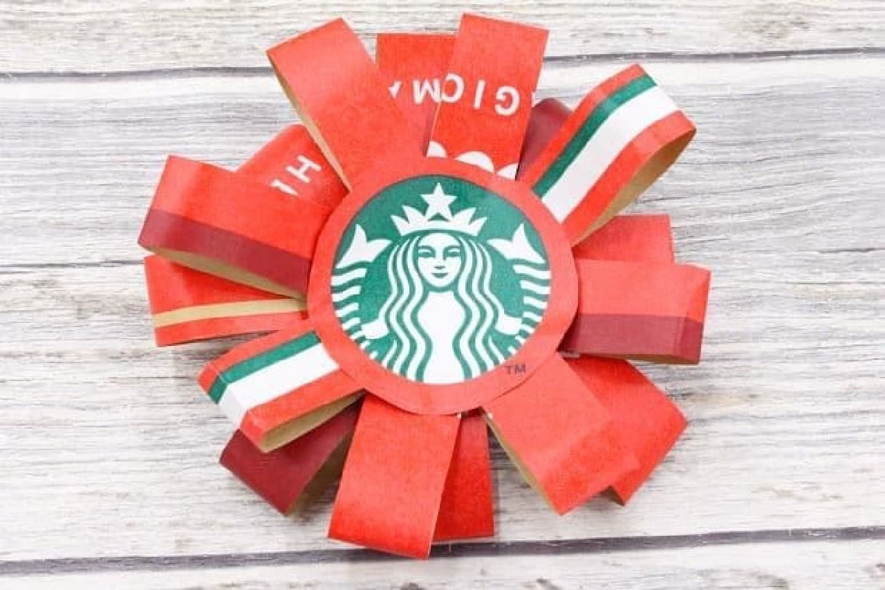 A coaster remade from a Starbucks holiday limited paper bag
