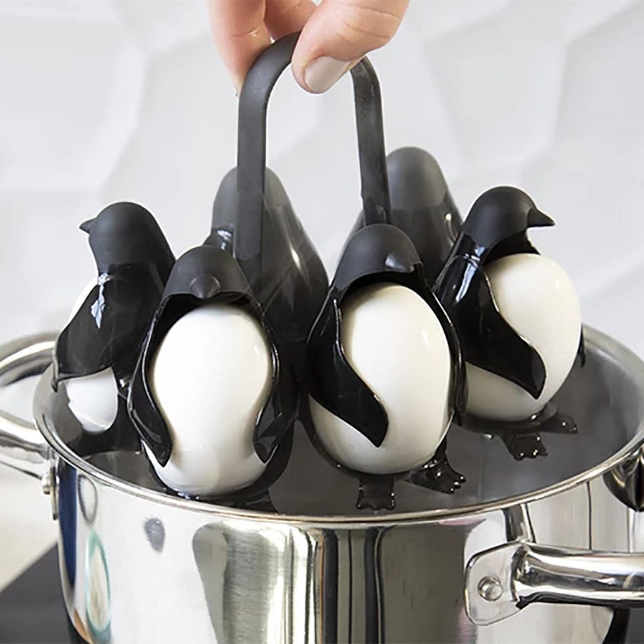 Penguin shaped egg holder "Egguins".