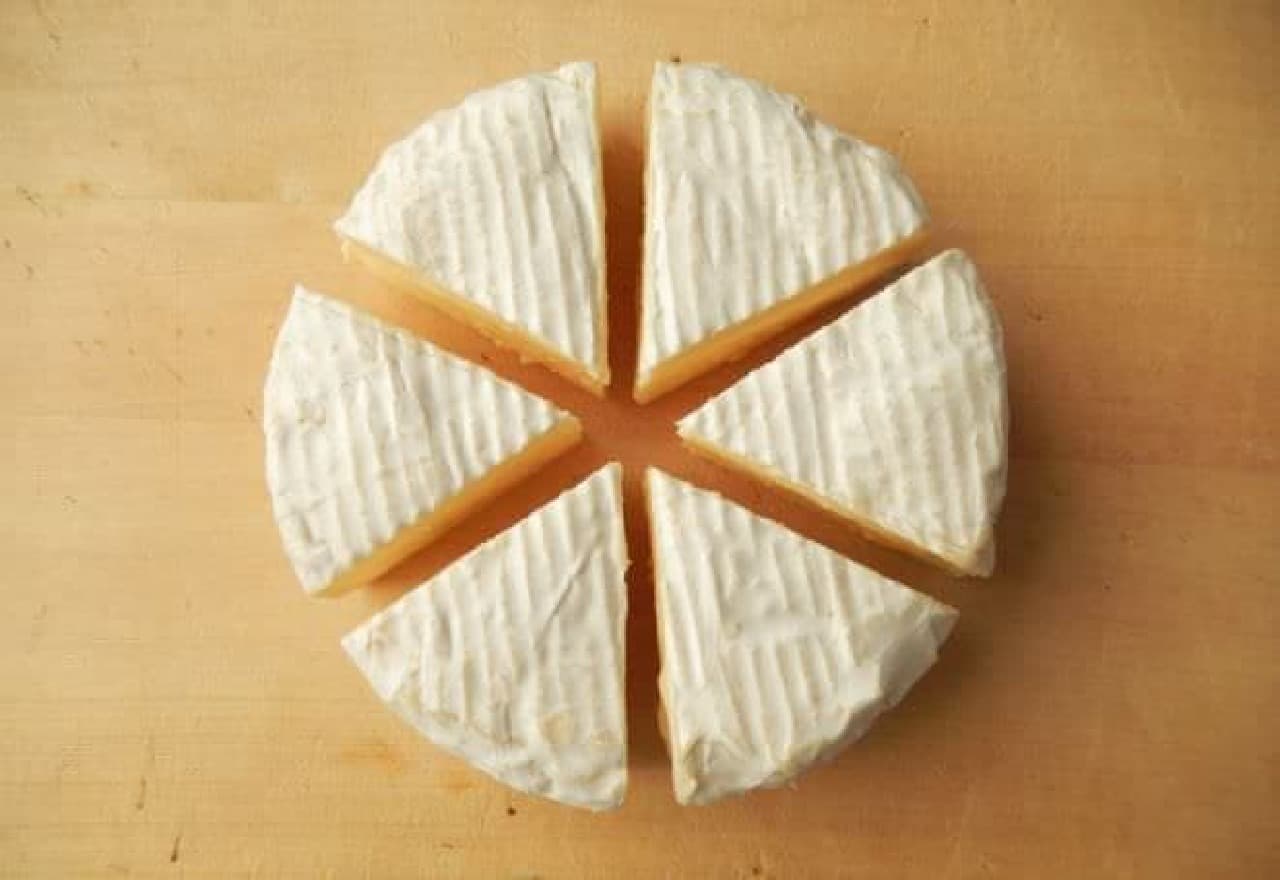 Roasted whole Camembert cheese
