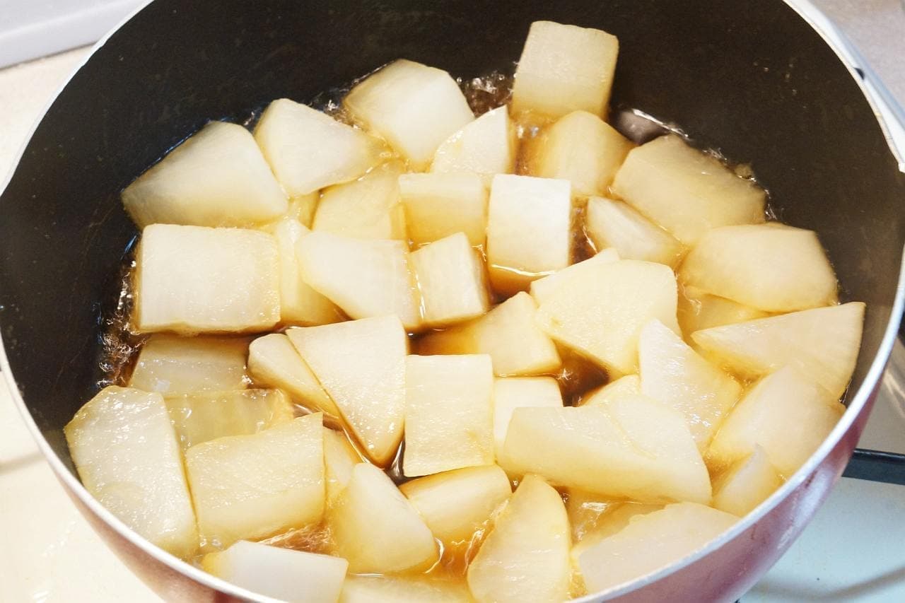 Daikon radish simmering in a pot