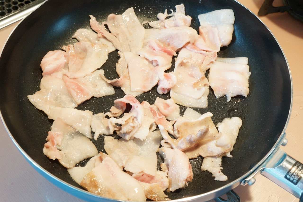 Pork fried in a frying pan