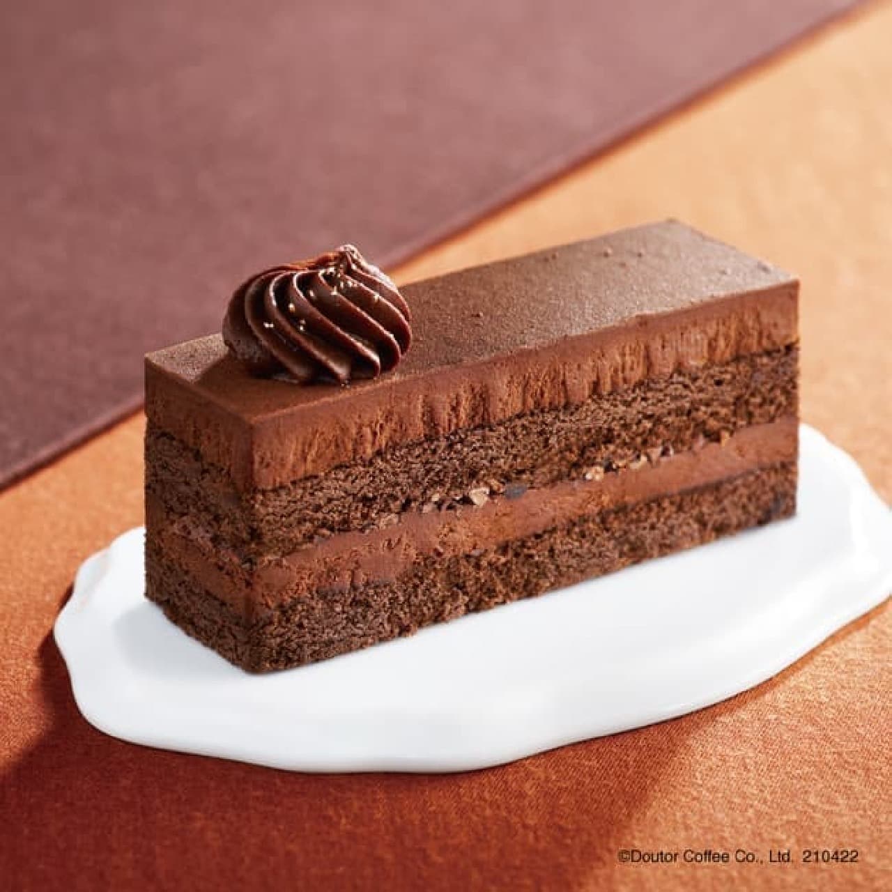 Excelsior Cafe "3 types of chocolate cake-using Belgian couverture chocolate-"