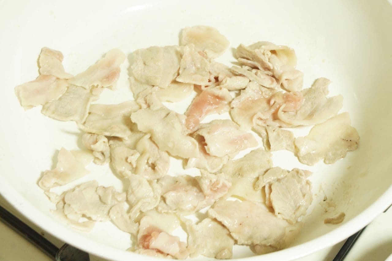 Stir-fried pork ribs in a frying pan