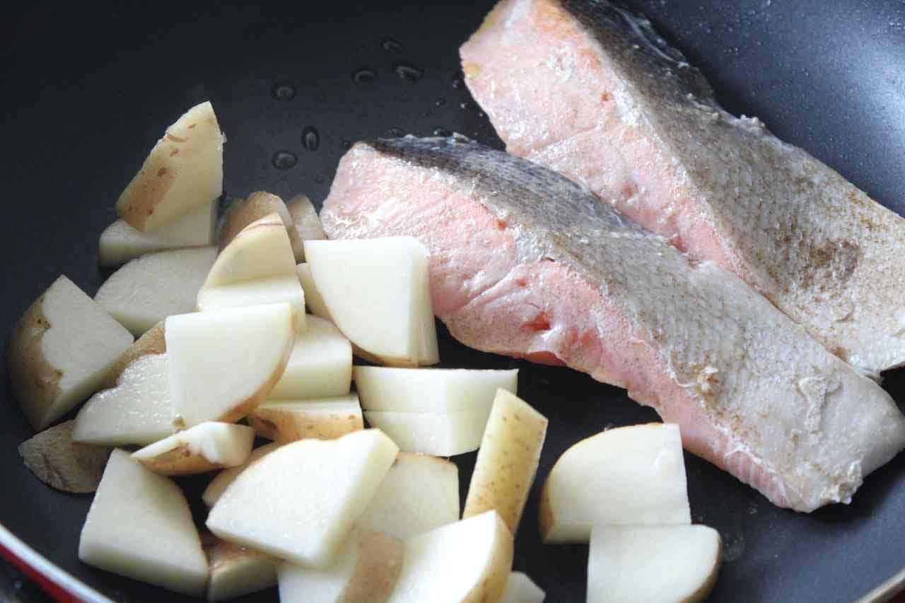 Boiled salmon and potatoes in salt butter