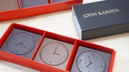 Chocolate with "time to eat" drawn on it. John Kanaya "Care de Chocolat"-to match spices such as cinnamon and black pepper