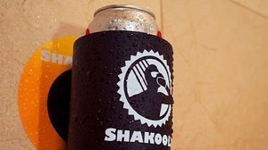 Beer can holder "SHAKOOLIE" where you can drink beer while taking a shower