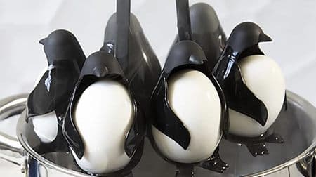 Egguins" penguins hold eggs in an egg holder! The egg becomes the penguin's belly and it's so cute!