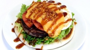 pizza? Or is it a hamburger? "Pizza Burger" eaten with a knife and fork, from freshness