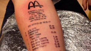 A boy with a Mac "receipt" tattoo on his arm talks about--this is a "royal customer"?