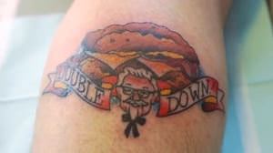 This is KFC! There was a man with a tattoo on the face of "Uncle Kernel"