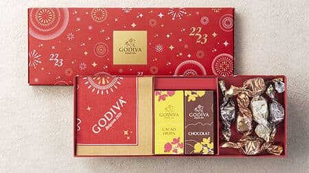 Godiva "Pre-New Year Set" for New Year's Eve and New Year's Day Gift set of G-cubes and other items in a box representing fireworks celebrating the New Year.