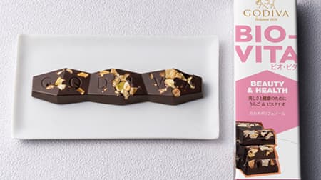 Godiva "BIO-VITA BAR" health-conscious dark chocolate bar with apples and pistachios for easy enjoyment.