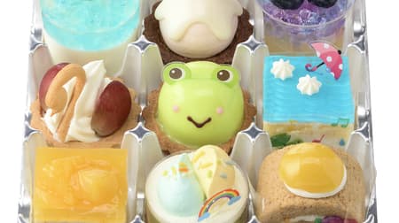 Ginza Cosy Corner "Frog's Summer Sky Walk (9 pieces)", the second series of picture book style sweets! Assortment of petit cakes, including "Frogs on a Summer Sky Walk," "Casa's Musicians," "Pool in the Pond," "Sparkling Hydrangeas," etc.