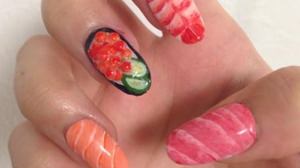 Thumb-sized Toro, egg on little finger? It is talked about that "sushi nails" are too real