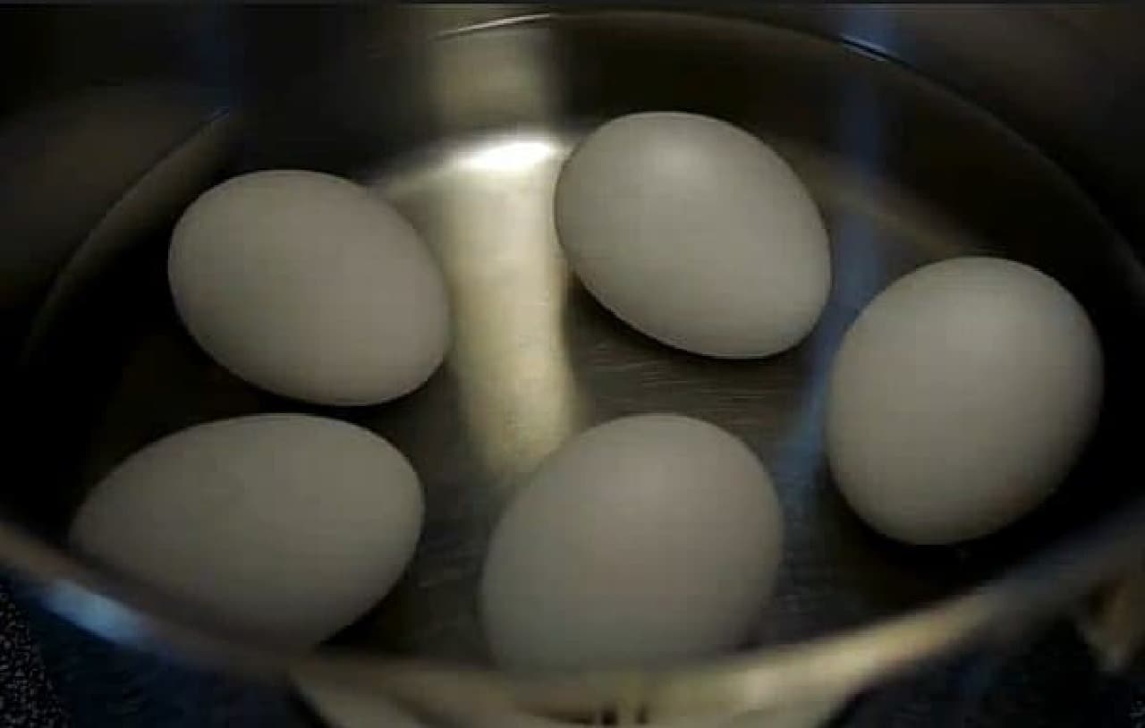 Boil the egg as you would a regular boiled egg.