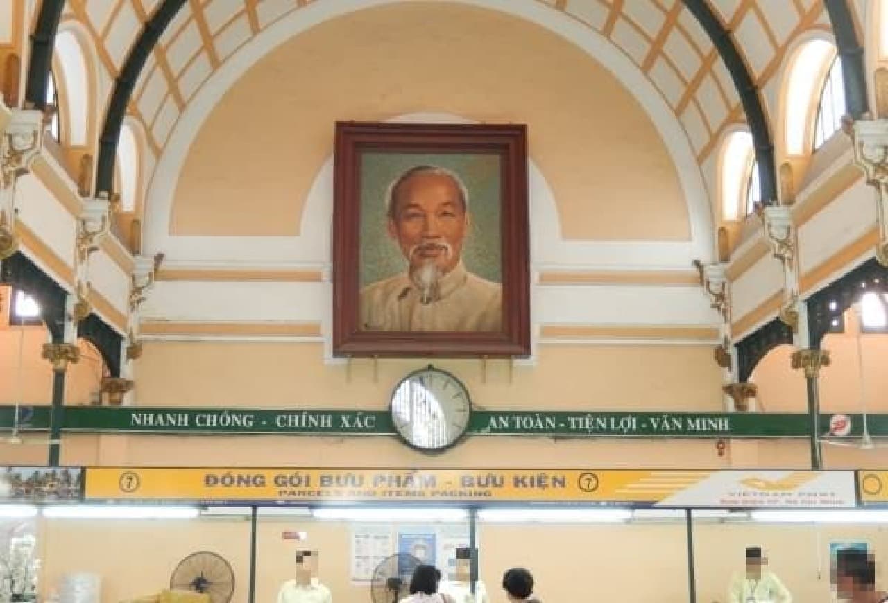 The one in that frame is Mr. Ho (this is the central post office)