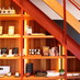 Product shelves under the stairs | Dandelion Chocolate (Kuramae)