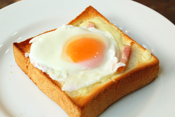 Croque Madame-style fried egg. Accented with salty bacon