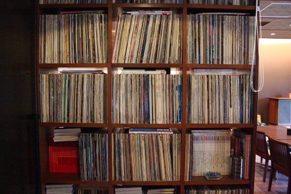A shelf full of records. You can also request songs