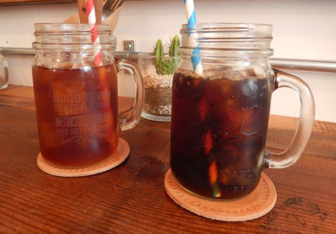 Iced tea (back left) and iced coffee (front right) are in fashionable jars