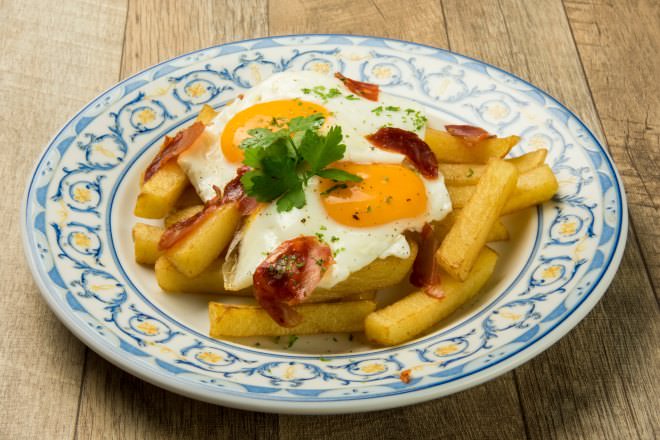 French fries chorizo with soft-boiled egg